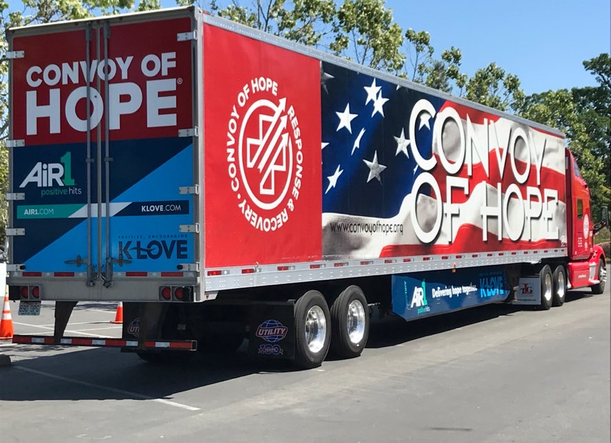 large semi truck with convoy of hope