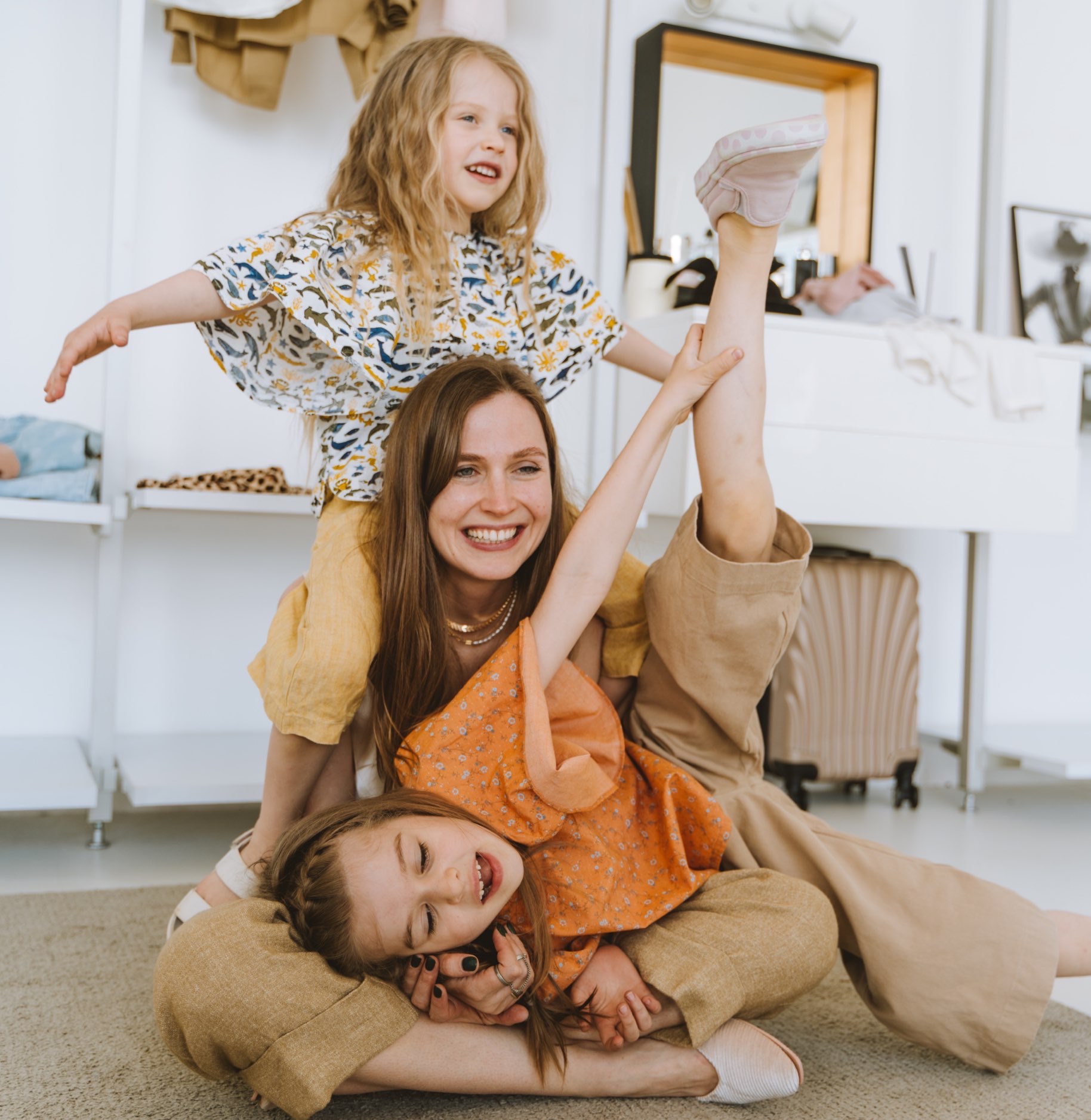 woman playing with kids